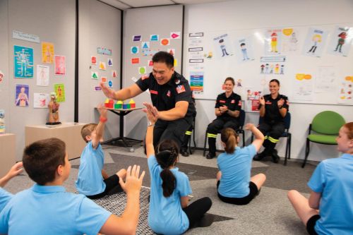 Firefighters educating children on fire safety